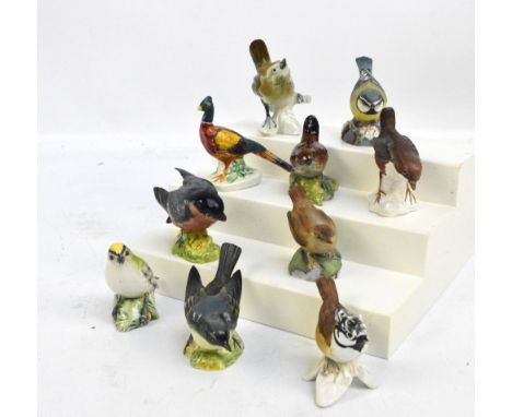 Six Beswick figures of birds to include "Gold crest", model no.2415, "Wren", model no.993, and "Blue tit", model no.3199, als