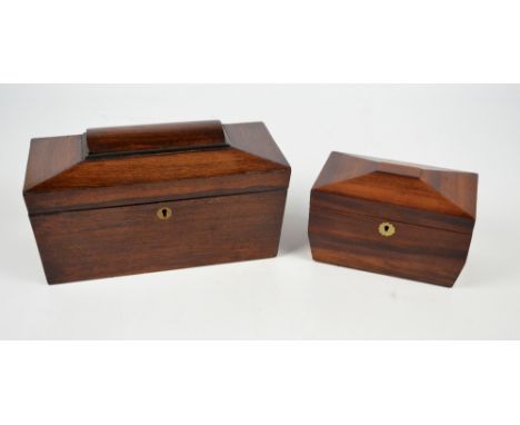 An early 19th century mahogany sarcophagus tea caddy, the Moroccan leather lined hinged lid enclosing three section interior,