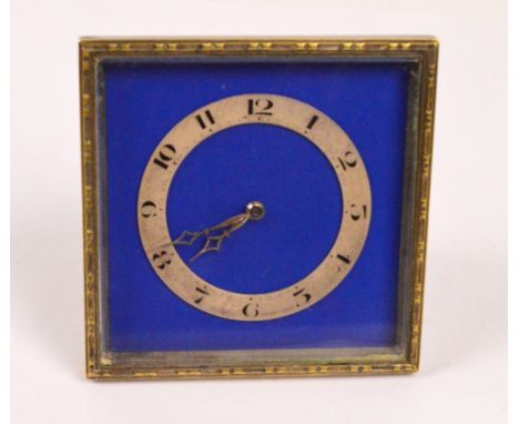 An early 20th century travelling clock, the square blue enamel decorated face with applied circular chapter ring set with Ara