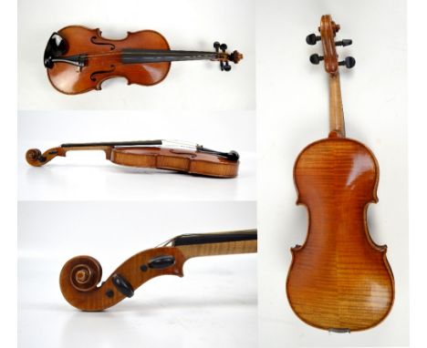 A German Stradivarius copy full size violin, with two-piece back, length of back 36cm, bearing label "Bernard Renatti Markneu