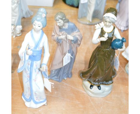 A Nao figure of Jesus, a Gama porcelain figure of a woman with jug and birds, and a Casades figure of a geisha (af) (3).
