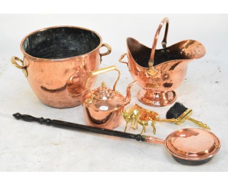 A mixed lot of metalware comprising copper helmet form coal scuttle, log bucket, kettle, warming pan, figures of deer, etc.