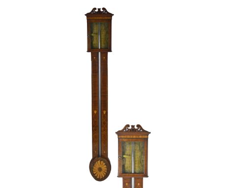 A George III mahogany and satinwood inlaid stick barometer with hinged door enclosing a paper dial beneath pierced broken swa