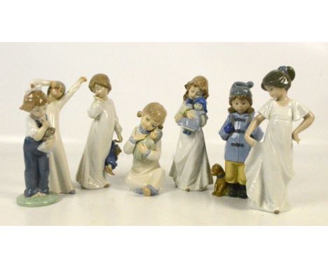 A group of five Nao figures, to include boy in duffle coat with dog, girl holding doll, with a further two Zaphir figures (7)