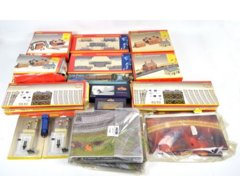 A quantity of Hornby train set accessories, to include 00 gauge track, signals, train mats, track mat accessory packs and a "