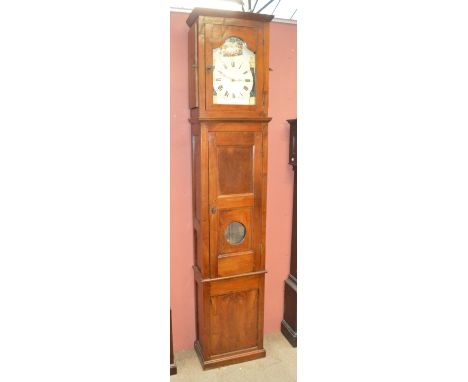 A 19th century French Provincial elm longcase clock, the arched painted dial set with Roman numerals and glass viewing panel 