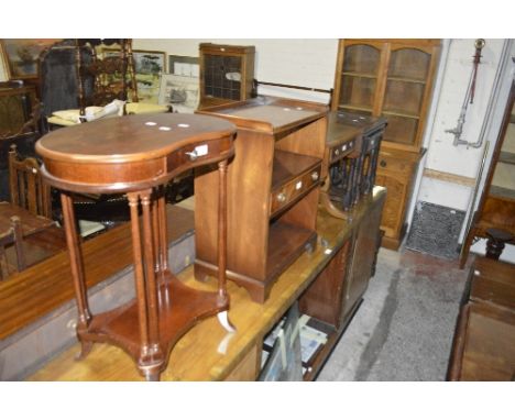 A kidney shaped occasional table, a nest of carved oak tables, an Ercol plate rack, a small side cabinet, a small sofa table 