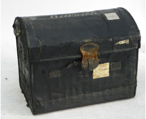 An unusual and large 19th century coach trunk, domed top bearing remnants of labels and inscribed "Warwick", with lift out tr