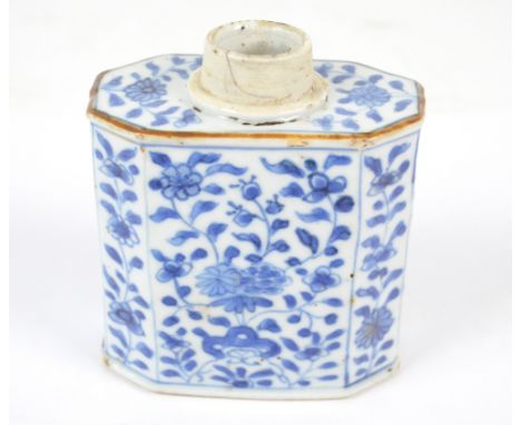 A 19th century Chinese porcelain tea caddy of rectangular form with canted corners, painted in underglaze blue with floral an