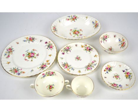 A quantity of Minton "Marlow" dinner and teaware comprising cups, saucers, twin handled soup bowls, dinner plates, side plate