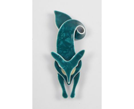 A Lea Stein brooch in the form of a dark turquoise fox with twisted end, mounted with a Lea Stein pin, height 10.5cm. CONDITI