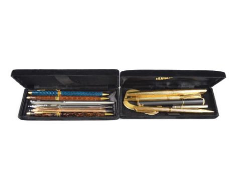 A boxed Waterman set of fountain pen, ballpoint pen and pencil, a small quantity of pens and a lighter in the form of a pen.
