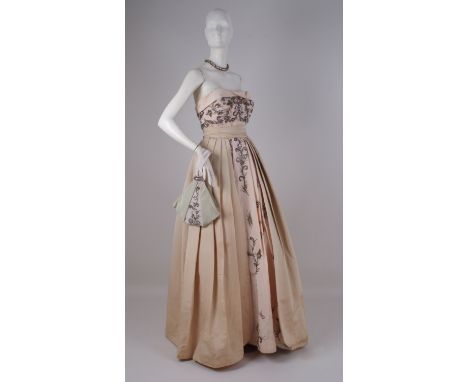 A 1950'S CHARLES FREDERICK WORTH SILK BALL GOWN  Made from gold and eau de nil grosgrain silk. Embellished in pearls, diamant