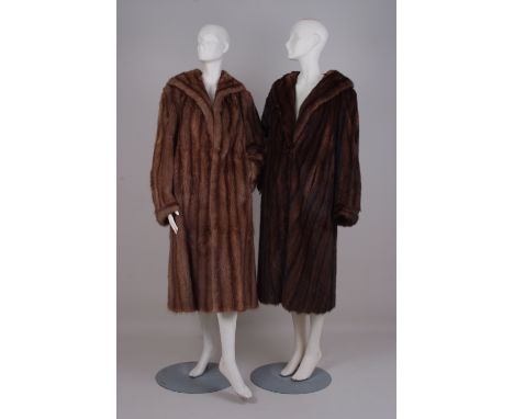 THREE 1950'S SWING BACK FUR COATS. A swing back fox fur coat with a mink style lustre, large back collar to be pulled up arou