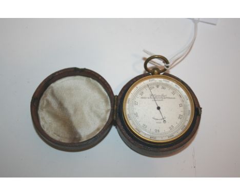 CASED POCKET BAROMETER by L Casella, Maker to the Admiralty & Ordnance London, with a silvered dial and gilt/brass case. In a