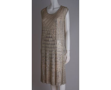 1920'S SILVER ASSUIT FLAPPER DRESS. This elegant flapper dress was made from the Egyptian assuit fabric, which was so popular