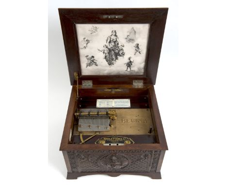 NICOLE FRERES 'REGINA' POLYPHONE MUSIC BOX a polyphone musical box in a heavily carved wooden case, made by Nicole Freres 'Re