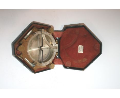 19THC CASED GERMAN COMPASS - ROSPINI an interesting brass compass with a silvered dial and levels on both sides. In a fitted 