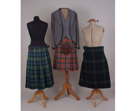 THREE VINTAGE MEN'S KILTS, JACKET, WAISTCOAT & SPORRAN. A green black and yellow plaid rough wool kilt, with leather straps a