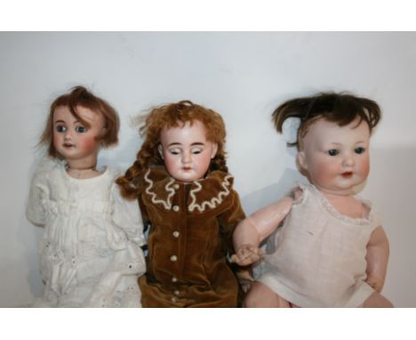 ARMAND MARSEILLE DOLL Model Number 1894, with weighted brown eyes and open mouth. Also with an Armand Marseille doll, Model N