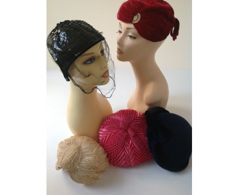 A QUANTITY OF ASSORTED HATS. A 1940's raffia hat. a 60's pleated silk pill box hat, a 20's/30's sequin skull cap, A Jacoll fe