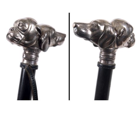 DOG HEAD WALKING STICK - SILVER an interesting walking stick with the top in the form of Dog's heads, made in silver and moun