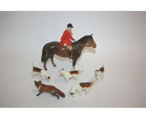 BESWICK HUNTSMAN Model Number 1501 Style Two Huntsman on a brown horse. Also with 4 Beswick hounds (one repaired) and a Fox. 