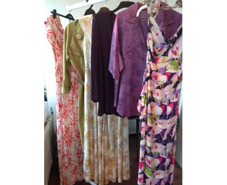 A LARGE QUANTITY OF 1940S DRESSES. To include a print crepe sun-dress, a purple rayon twill shirt blouse, a purple lurex crep