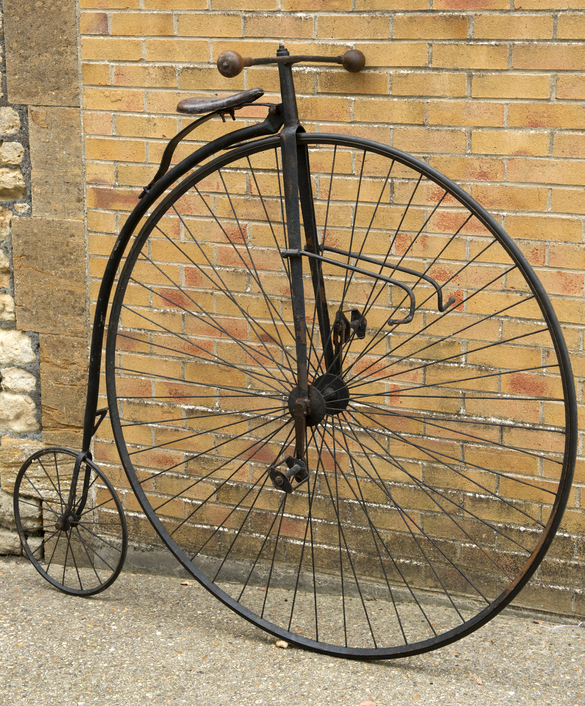 ANTIQUE PENNYFARTHING BICYCLE an antique PennyFarthing bicycle, with