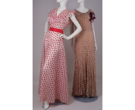 A COLLECTION OF 1930's/40'S/50'S EVENING DRESSES. A 1930's floral lace dress with a flower corsage on the shoulder. 26" high 