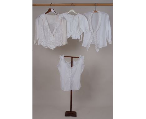 A COLLECTION EARLY C20TH LACE BLOUSES An Edwardian filet white lace cotton blouse, two Victorian cropped white cotton and lac