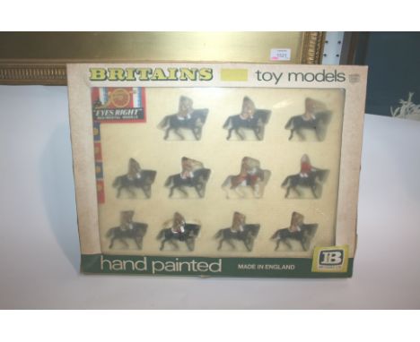 BRITAINS MOUNTED GUARDS a boxed set Model Number 7840, the 11 figures with 'eyes right'.