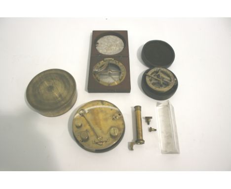 19THC COMPASS a brass compass with a silvered dial and in a fitted mahogany case. Also with a brass compass in a fitted leath