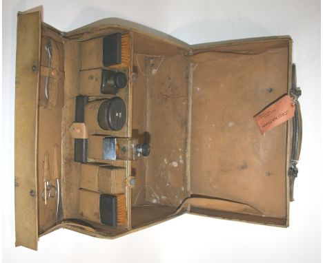 GENTLEMANS LEATHER TRAVELLING CASE a white leather fitted case with silver and wooden topped jars, silver and wooden topped g