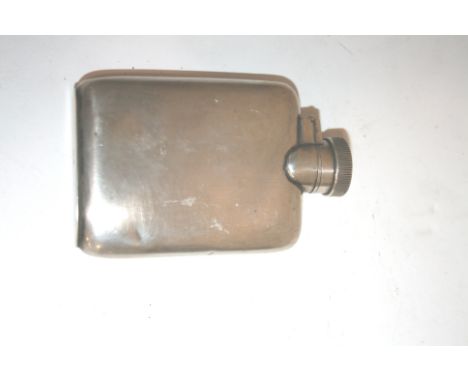 SILVER SPIRIT FLASK a small silver flask with a screw lid, hallmarked for Birmingham 1928. 9 1/2cms high