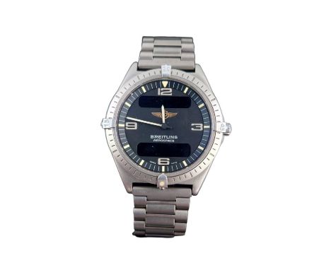 Gentleman's Breitling Aerospace quartz wrist watch the round Grey dial with numeral hour markers, two digital display apertur