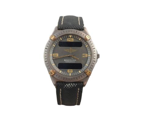 Gentleman's Breitling Aerospace stainless steel quartz wrist watch the round grey dial with Arabic hour markers, two digital 