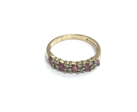 A 9ct gold ruby and diamond ring, approx 2.19g and approx size N-O. Shipping category A.