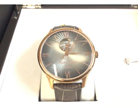 A Mathey Tissot Edmond watch. Case is 42mm stainless steel. Leather strap. With box and paperwork. Postage B