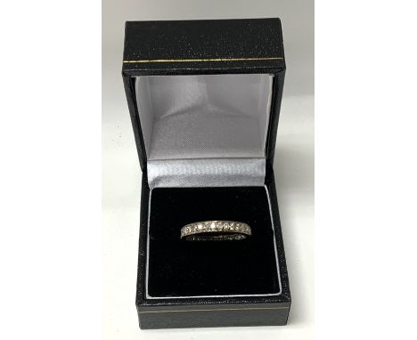 A gold full diamond eternity ring, Size R.5 (A)