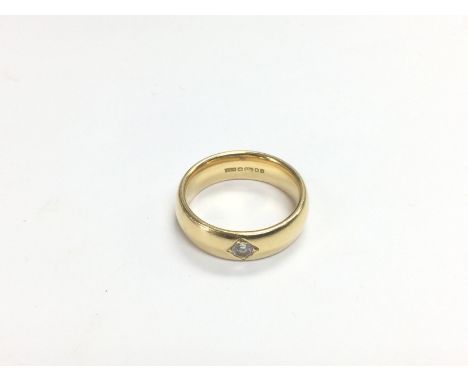 A heavy 18ct gold gents signet ring inset with a diamond, approx 15/20 points, approx 11.4g and approx size Q-R. Shipping cat