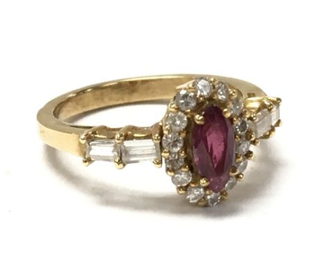 A 18ct gold ring set with Ruby and diamonds. size N 4.7g Postage category A