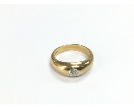 An 18ct gold signet ring inset with a single diamond, approx 0.35ct, approx 5g and approx size K. Shipping category A.