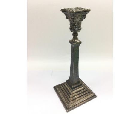 A silver candlestick, approx height 30.5cm. London hallmarks. Shipping category B.