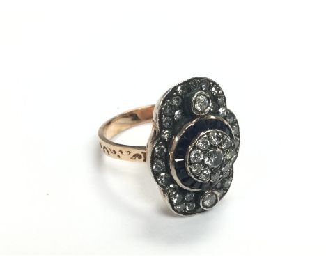 A certificated vintage style 8k rose gold sapphire and diamond cluster cocktail ring. Calibre cut sapphires 1.35ct, R/C diamo