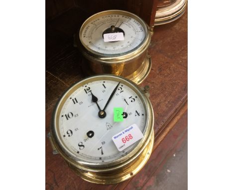 A ROYAL MARINER SHIPS CLOCK AND SCHATZ SHIPS BAROMETER