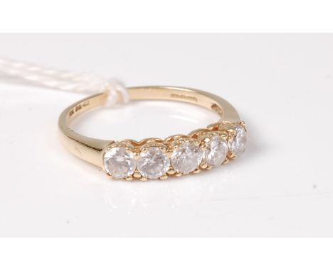 A lady's 14ct yellow gold dress ring, set with a row of five cz, size Q