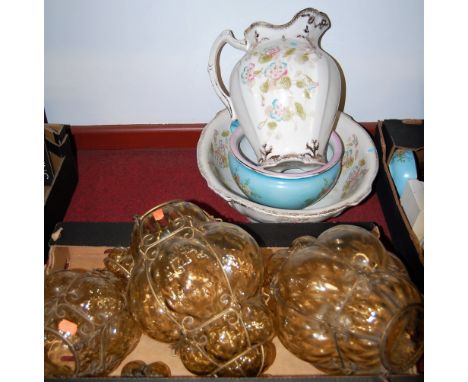 A set of three early 20th century yellow tinted hand blown glass ceiling light fittings