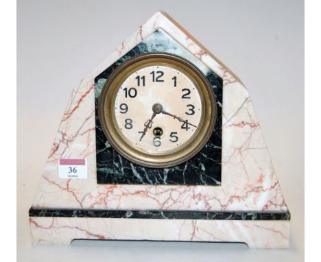 An Art Deco marble cased mantel clock of angular form having a painted dial with Arabic numerals, height 26cm