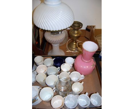 Two boxes of miscellaneous items, to include; Victorian opalescent glass oil lamp, a brass oil lamp, commemorative mugs and t